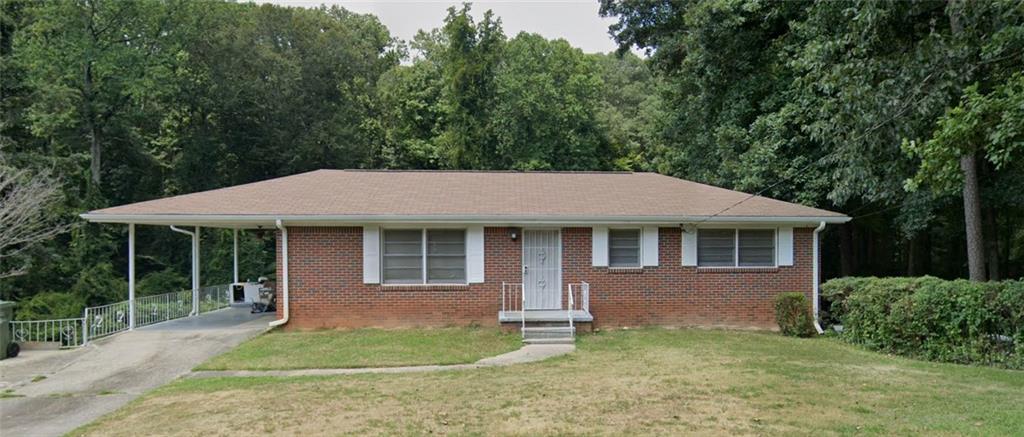 front view of a house with a yard