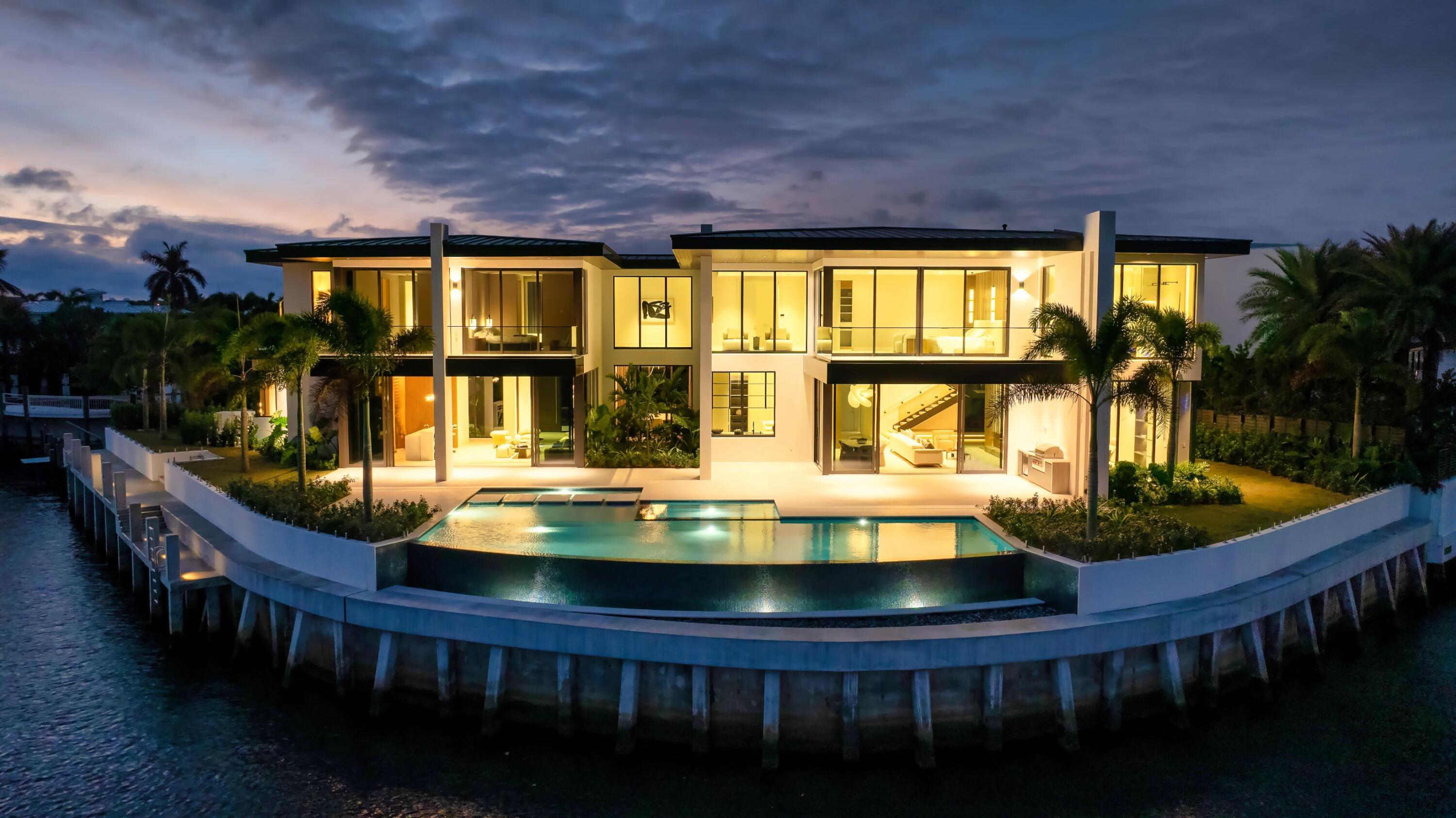 a view of swimming pool with outdoor seating