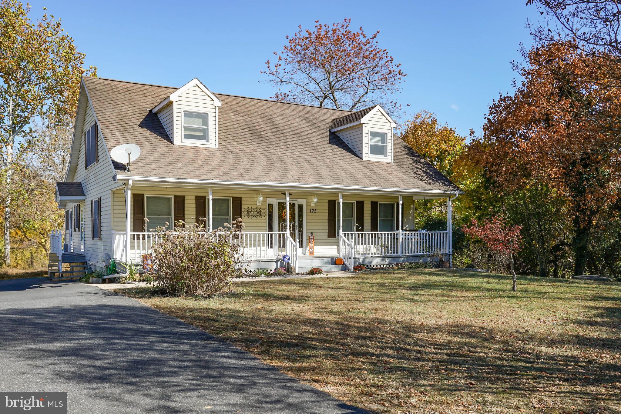 a front view of a house with swimming pool