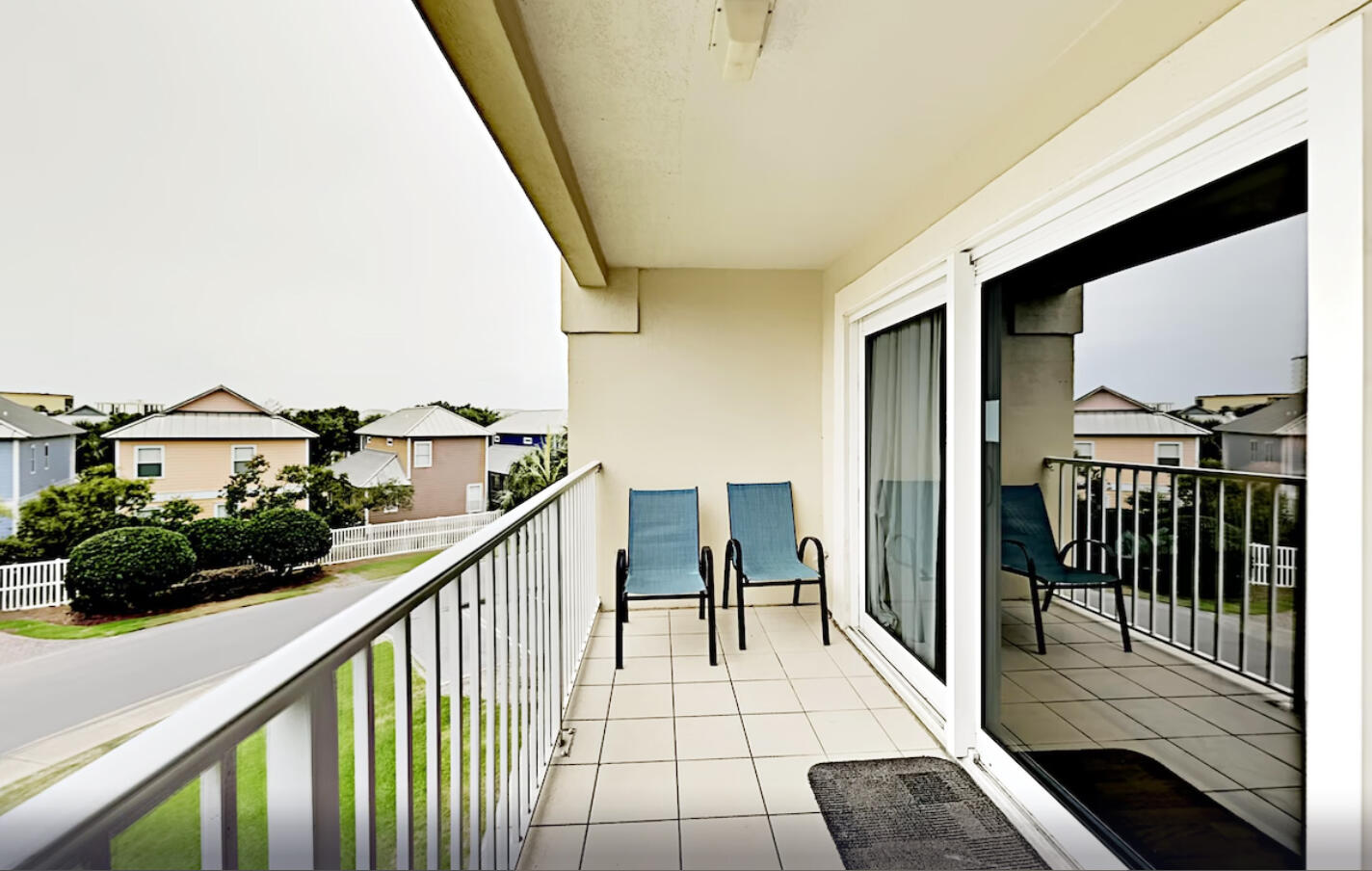 a view of balcony with furniture