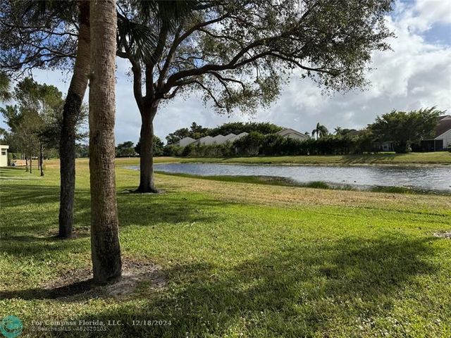 $335,000 | 6444 La Costa Drive, Unit 102 | Boca del Mar