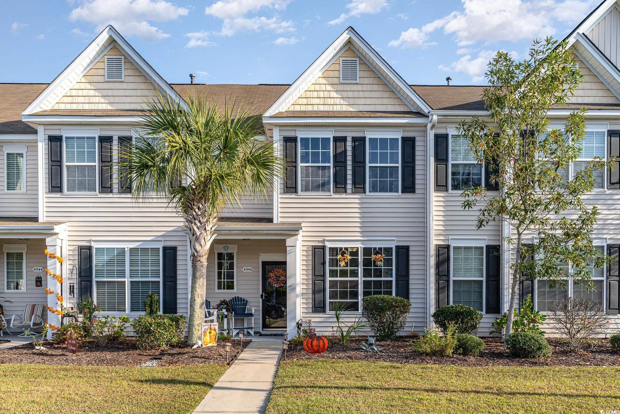 View of front of house with a front lawn