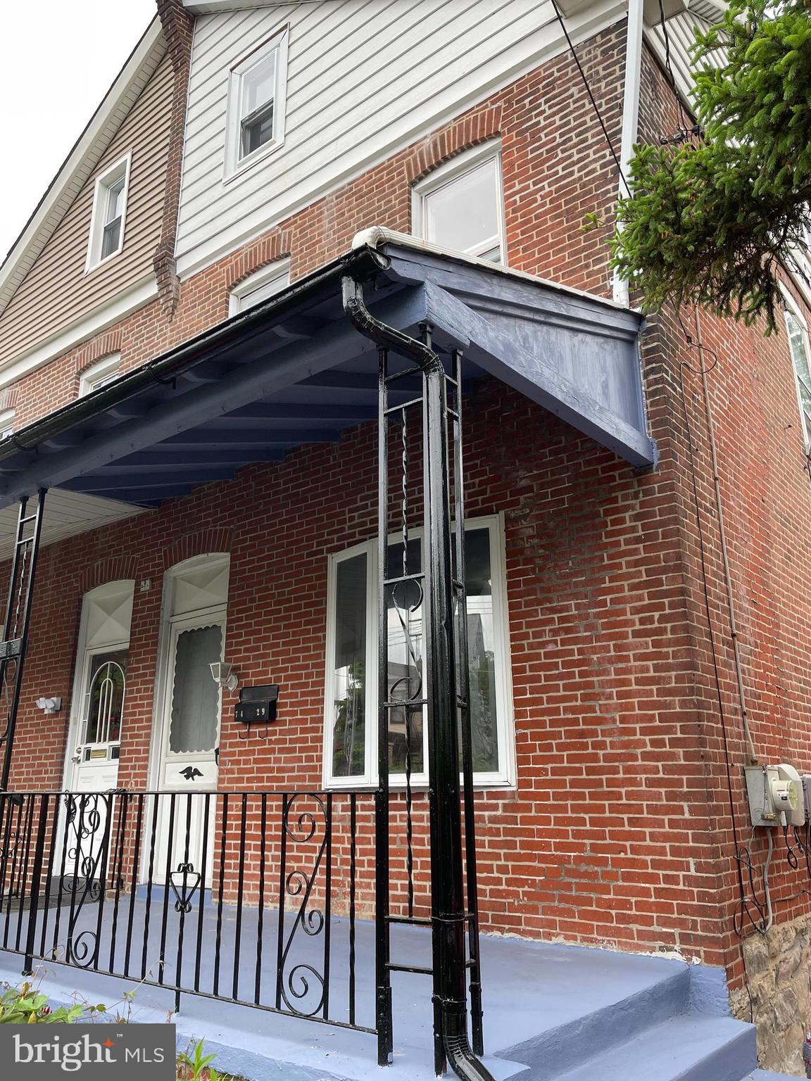 a view of a house with a porch