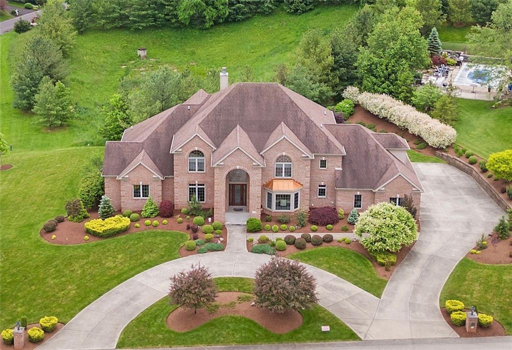 a aerial view of a house with garden