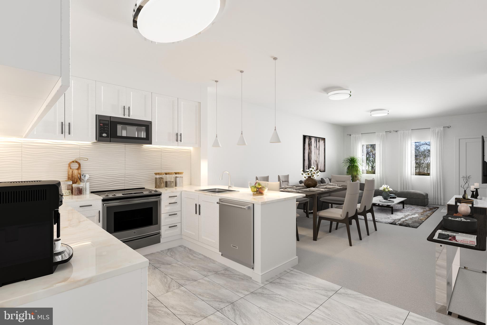 a kitchen with a stove top oven a sink a dining table and chairs