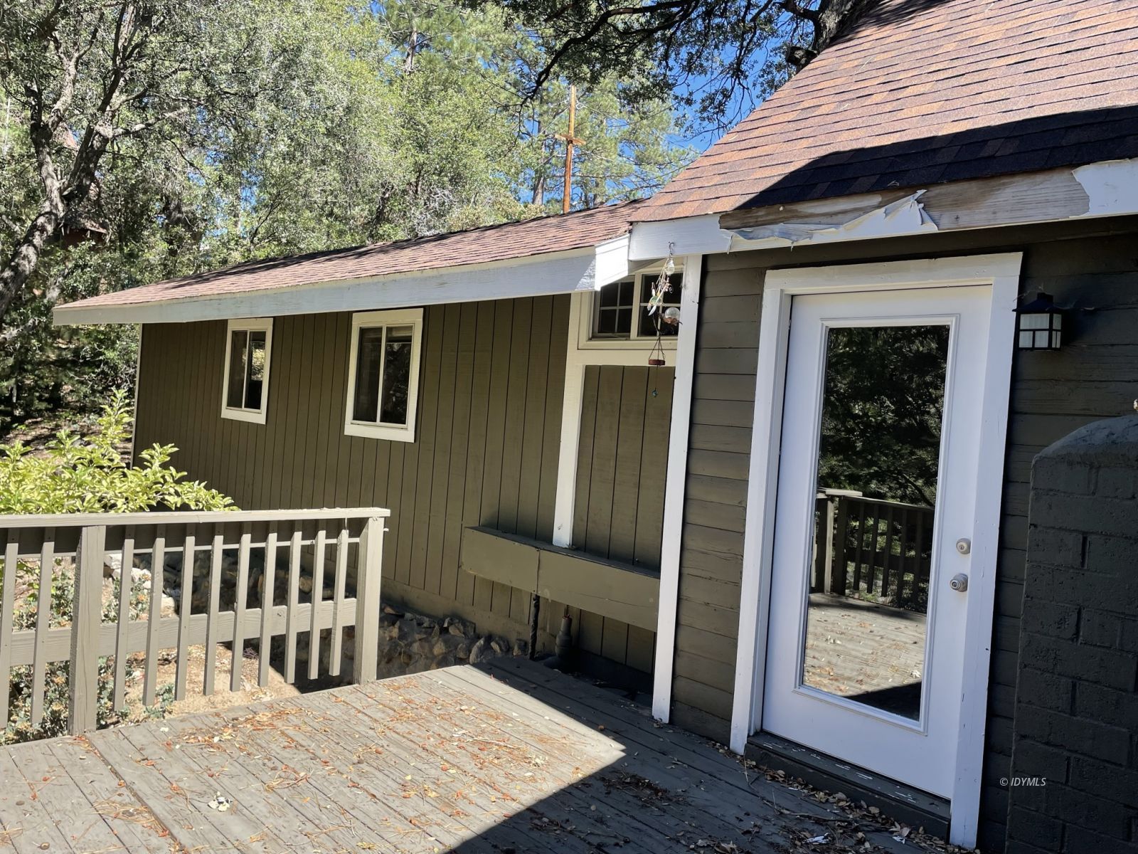 a view of a house with a deck