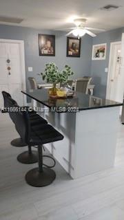 a dining room with wooden floor