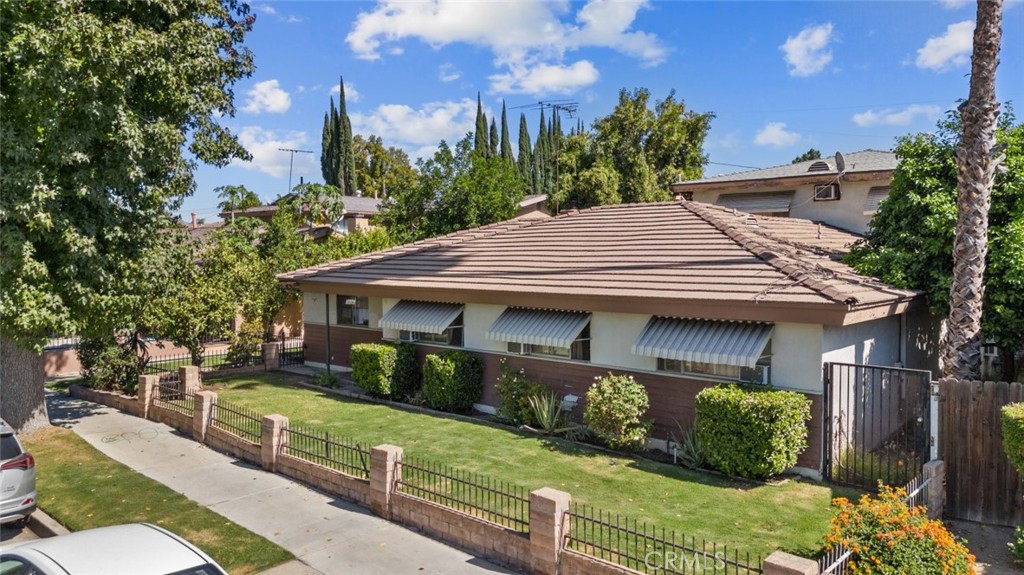 a house view with a garden space