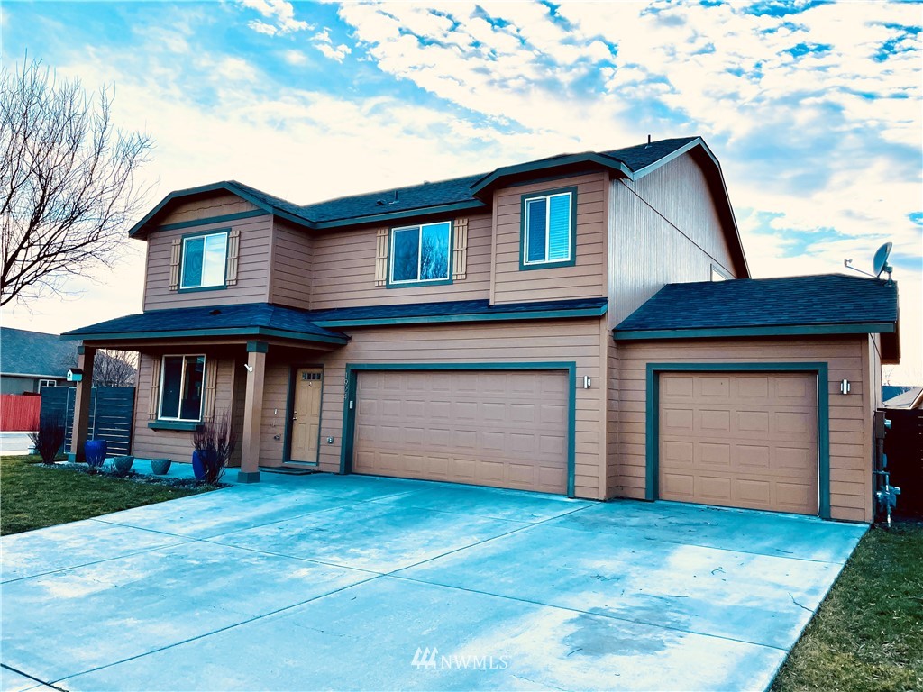 a house view with a garden space