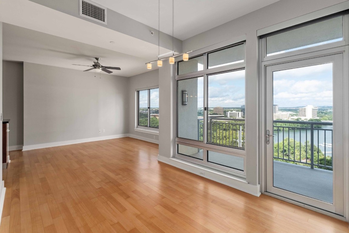 a view of an empty room with a balcony