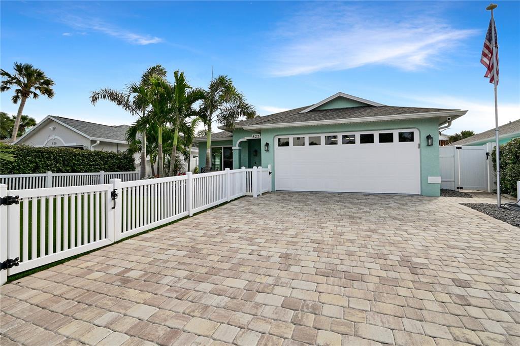 Expansive Paver Driveway and 2-car garage