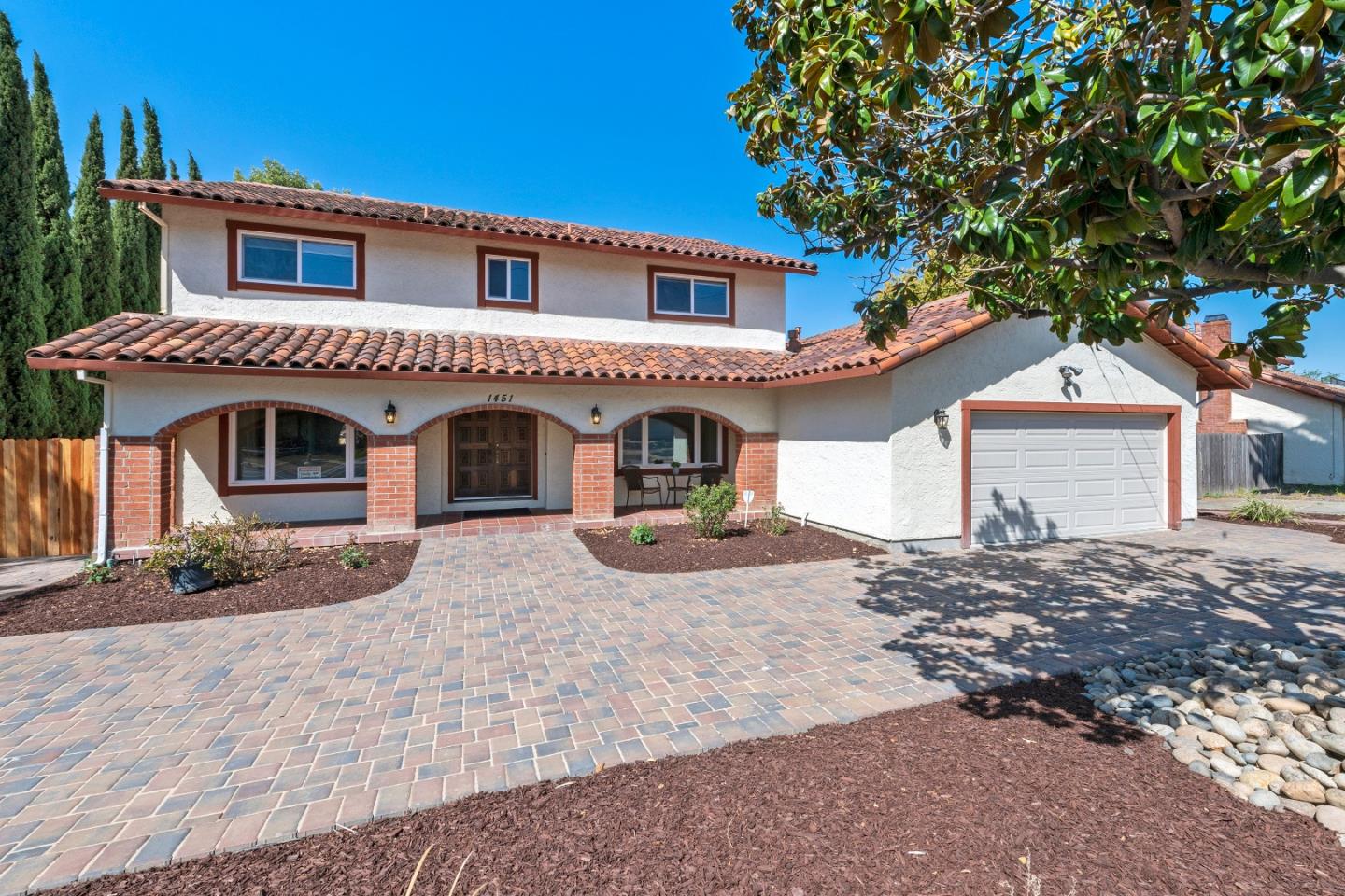 a front view of a house with entertaining space