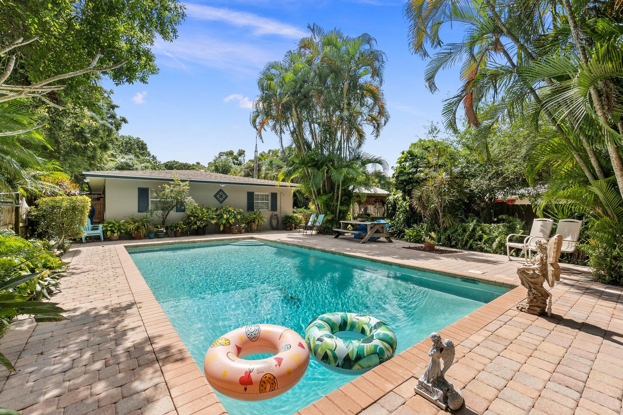 a view of a swimming pool with a patio