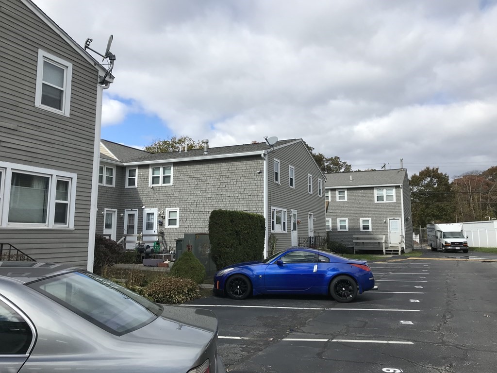 a car parked in front of a house