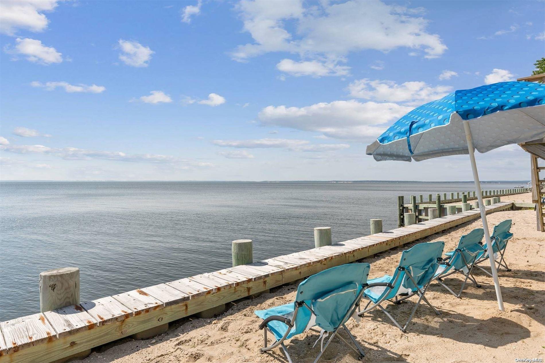 a view of a balcony with an ocean view