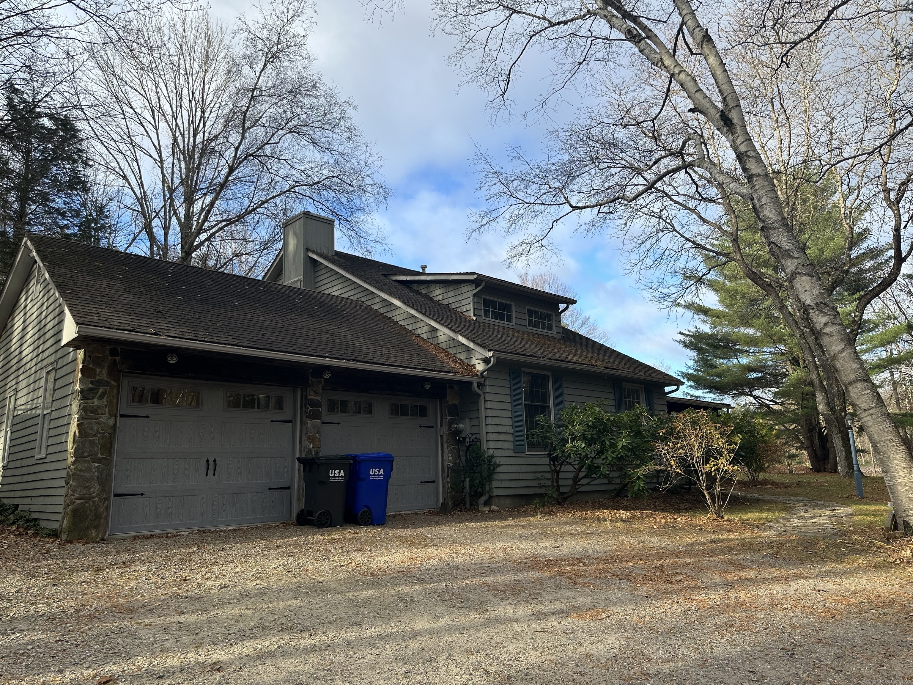 a house with trees in front of it