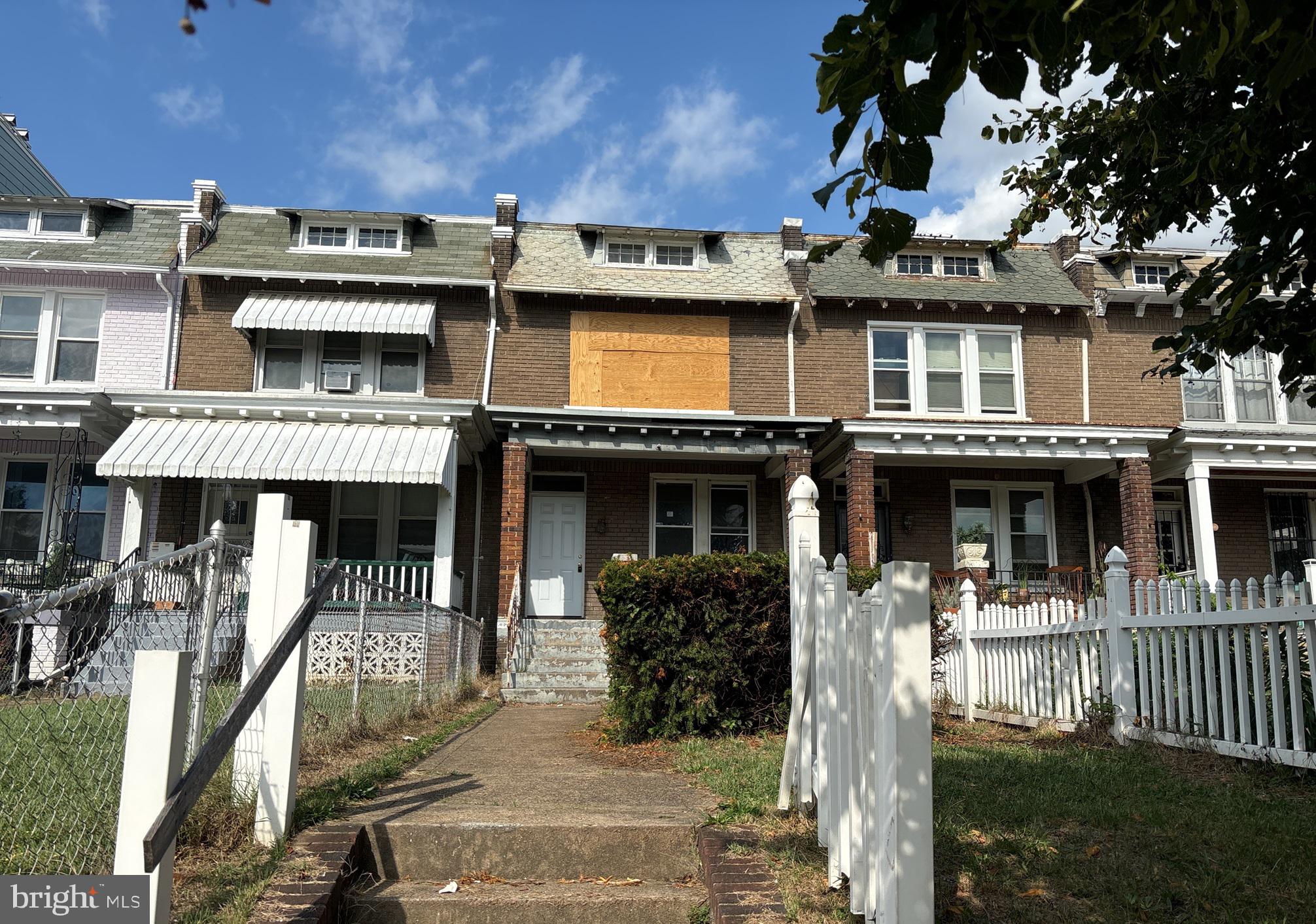 a view of a building with a porch