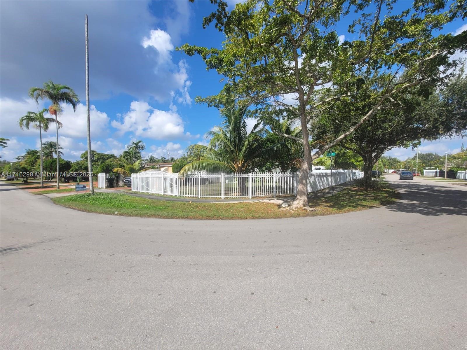 a view of a house with a big yard