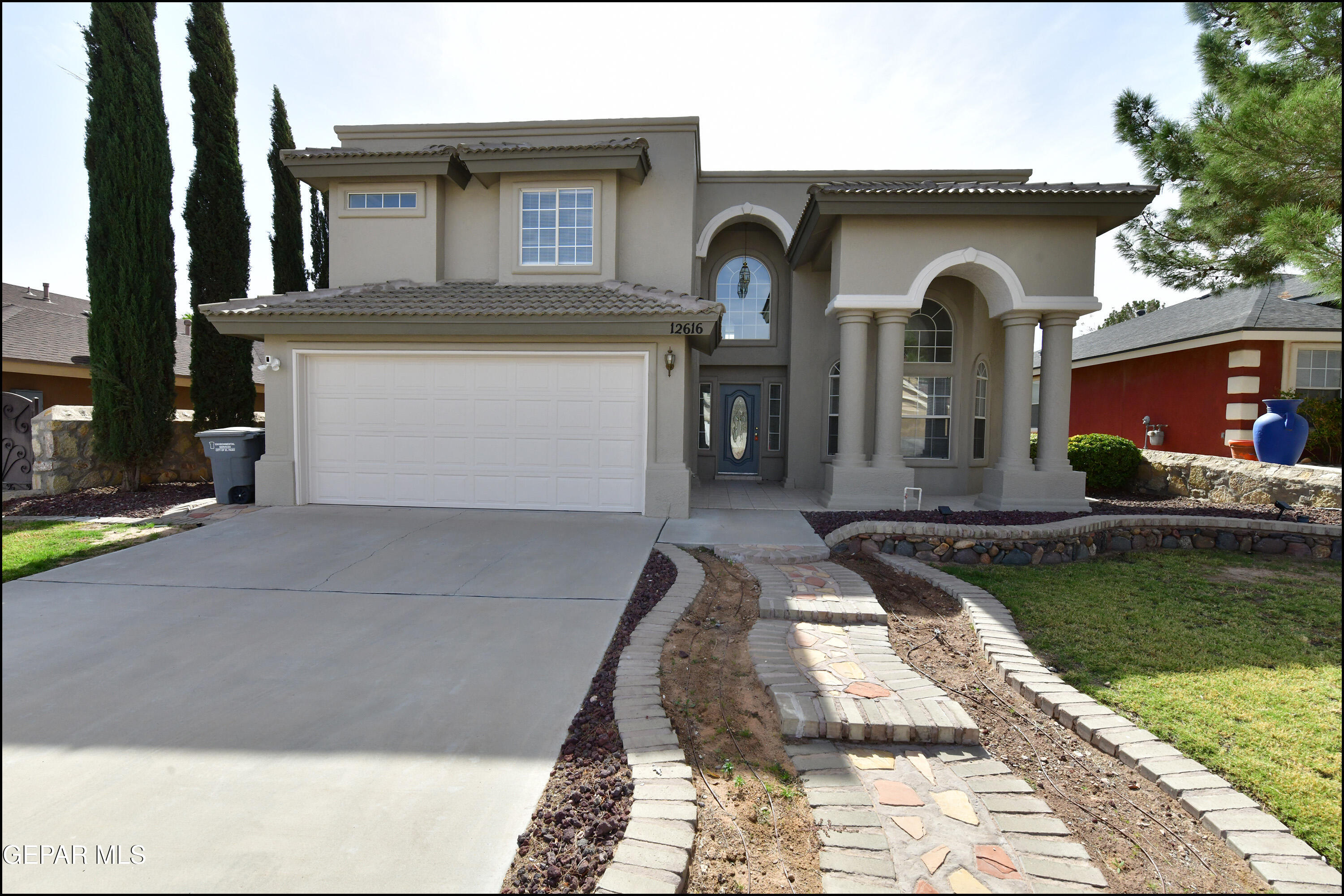 a front view of house with outdoor space