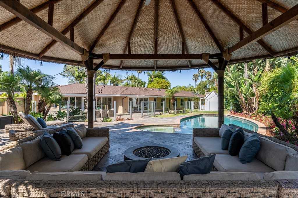 a outdoor living space with furniture and garden view