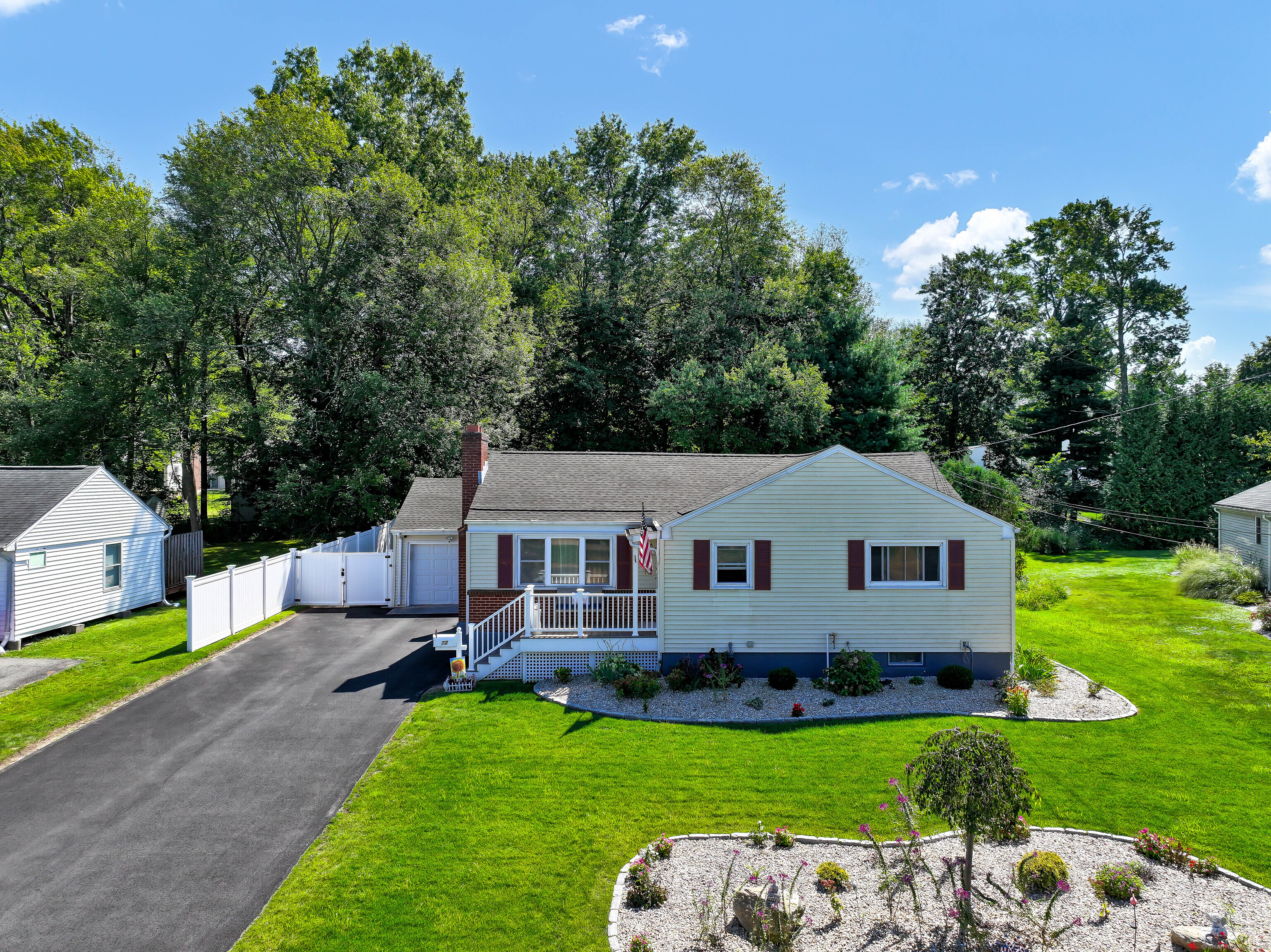 a aerial view of a house with garden