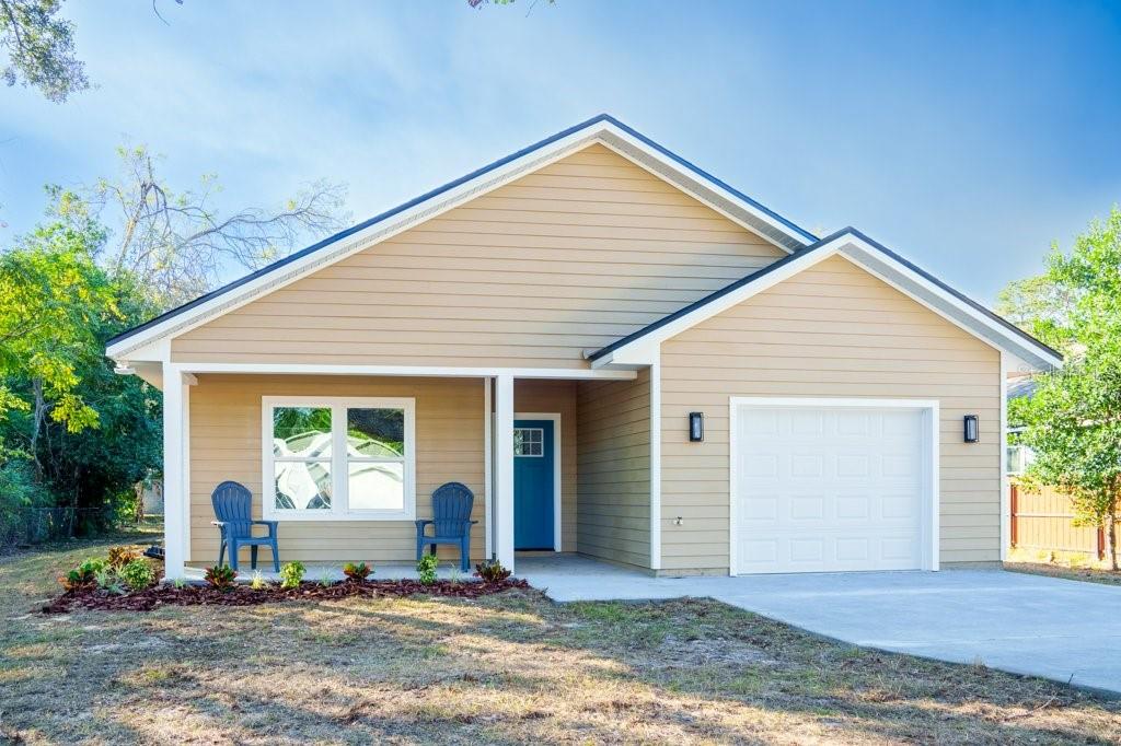 a front view of house with garage