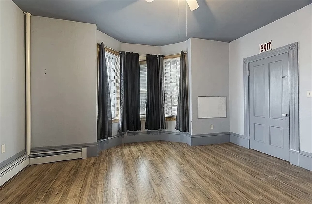 wooden floor and windows in a room