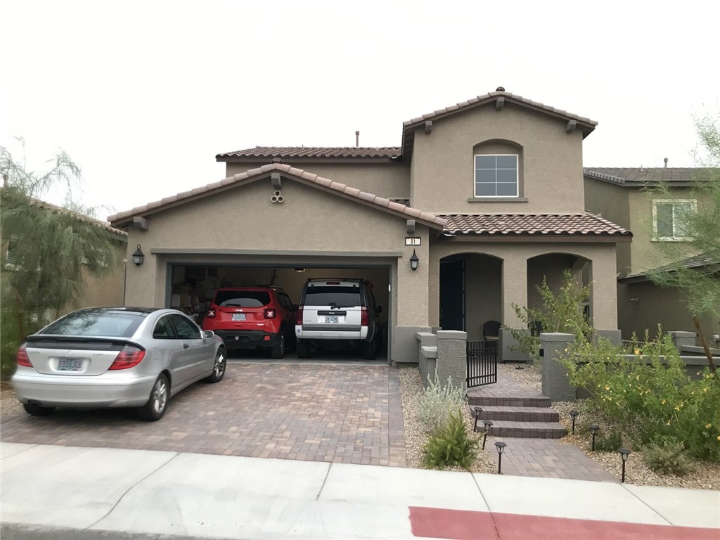 a car parked in front of a house