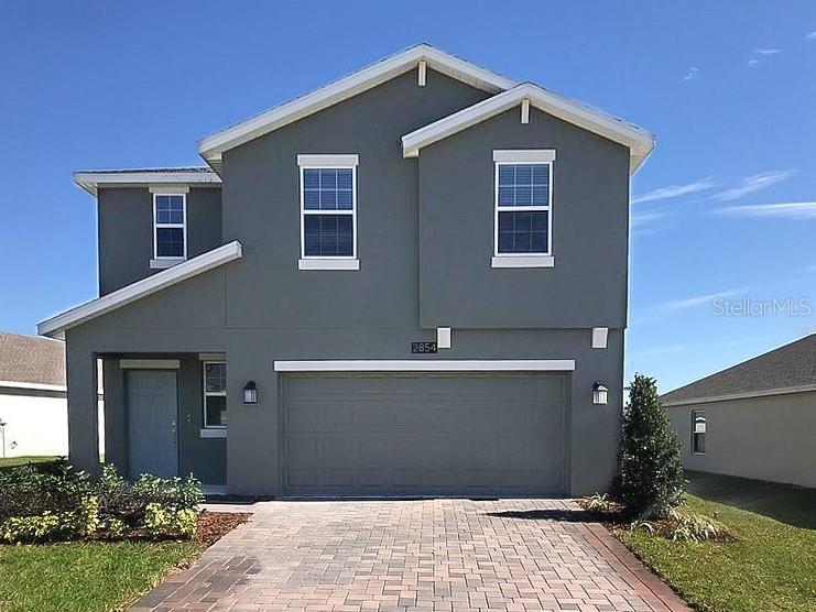 a front view of house with yard