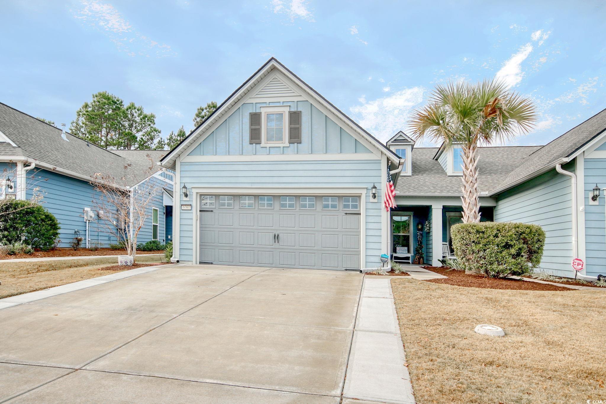 View of front of home with a garage