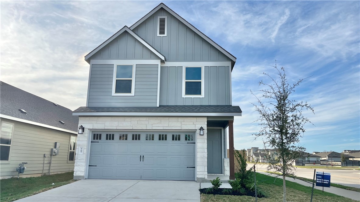 View of front of home with a garage