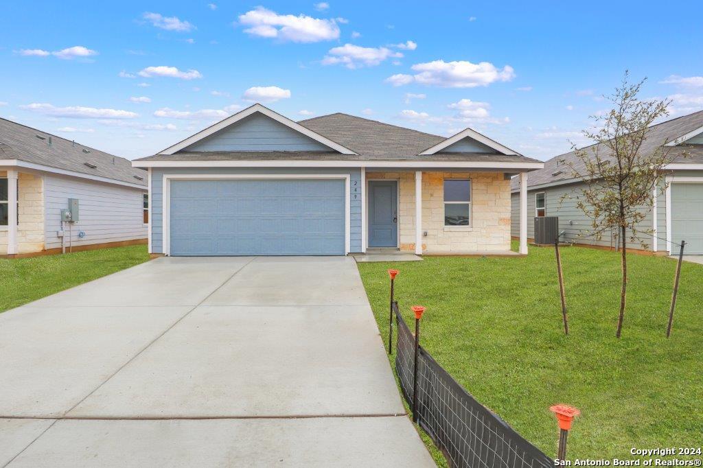 a front view of a house with yard