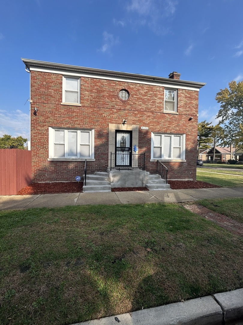 a front view of house with yard