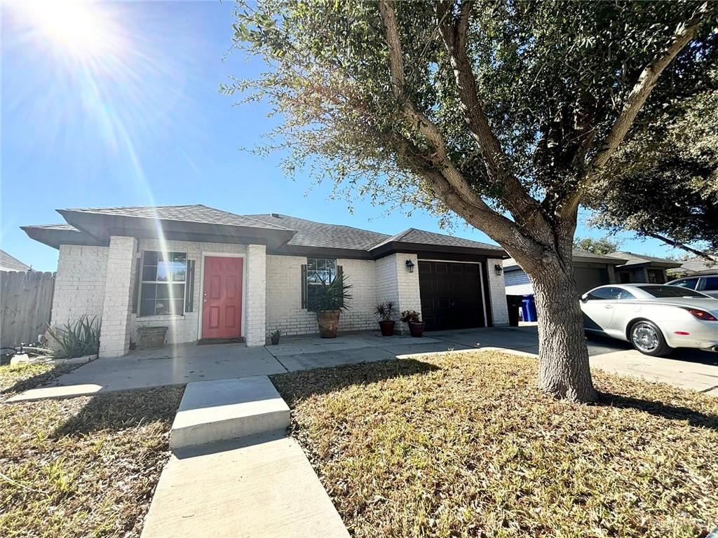 Single story home with a garage