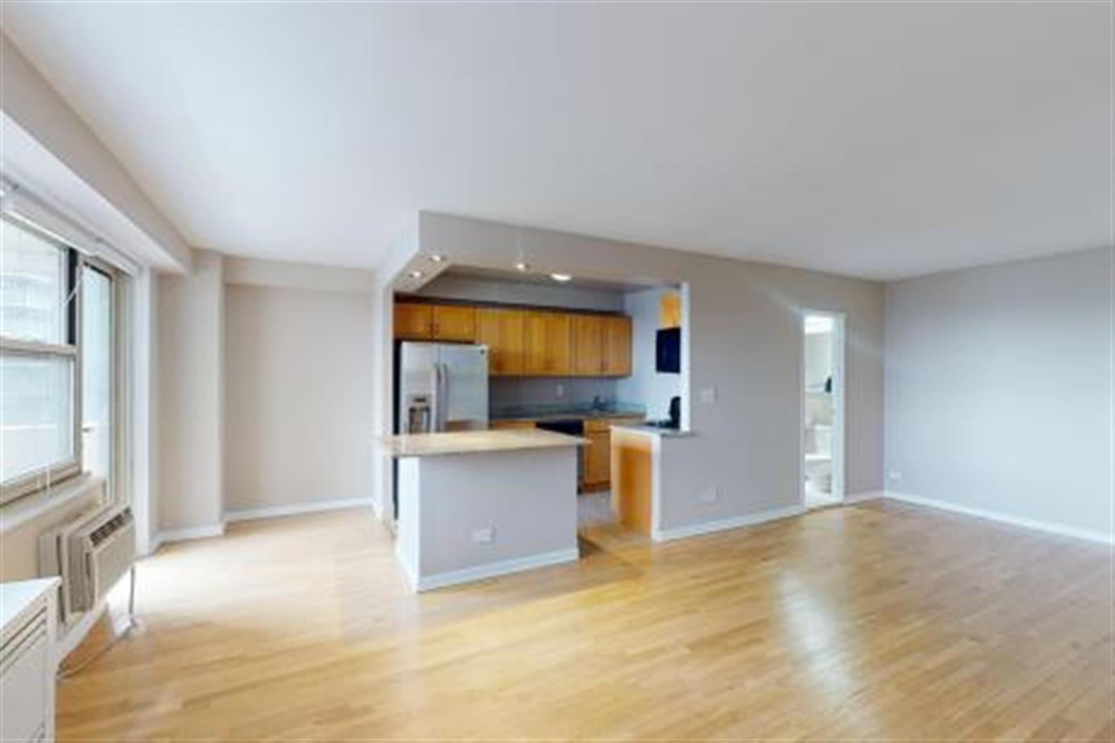 a view of kitchen and living room