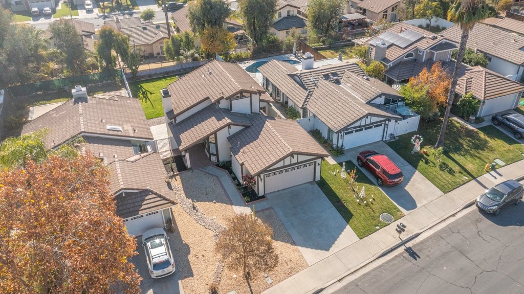 an aerial view of a house with swimming pool