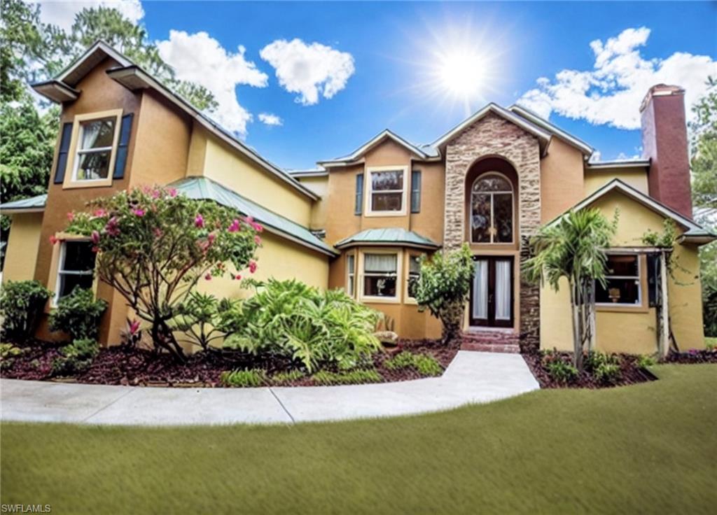 View of front of property with a front lawn