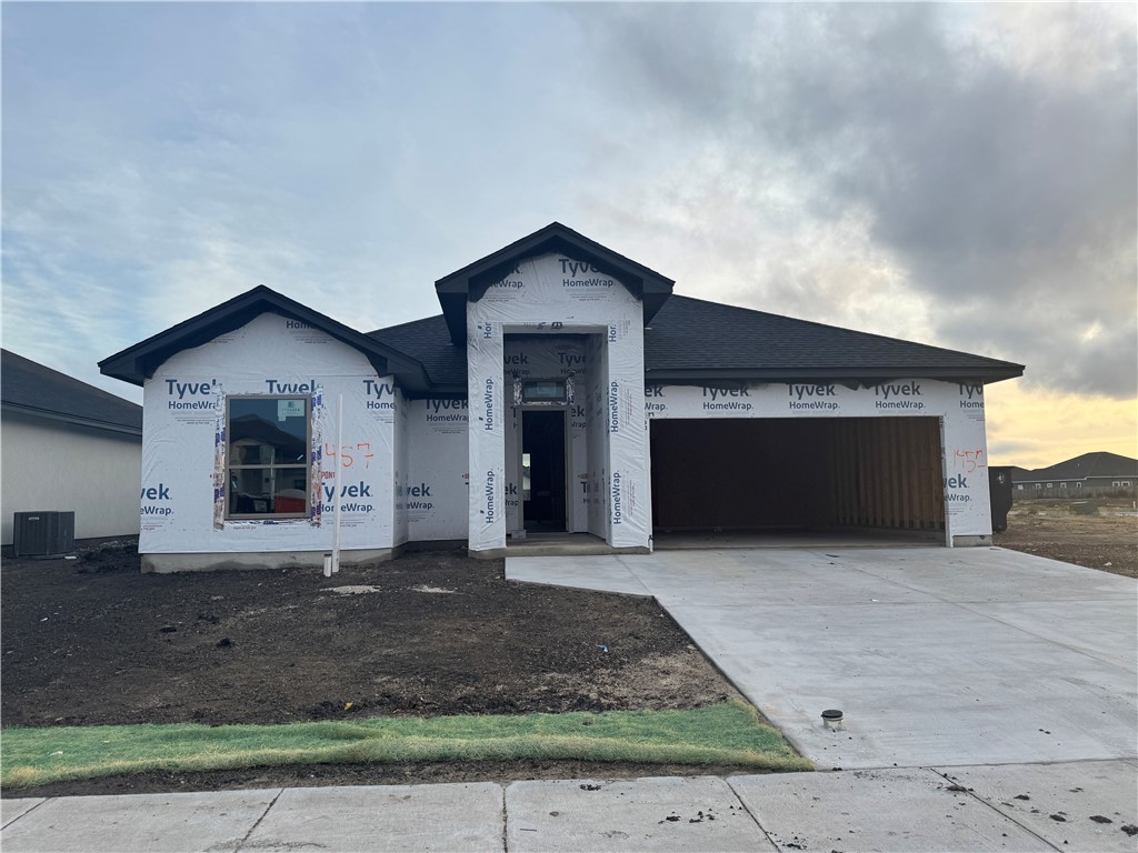 a front view of a house with yard