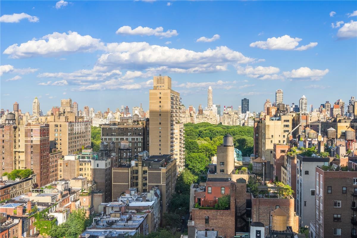 a view of a city with tall buildings