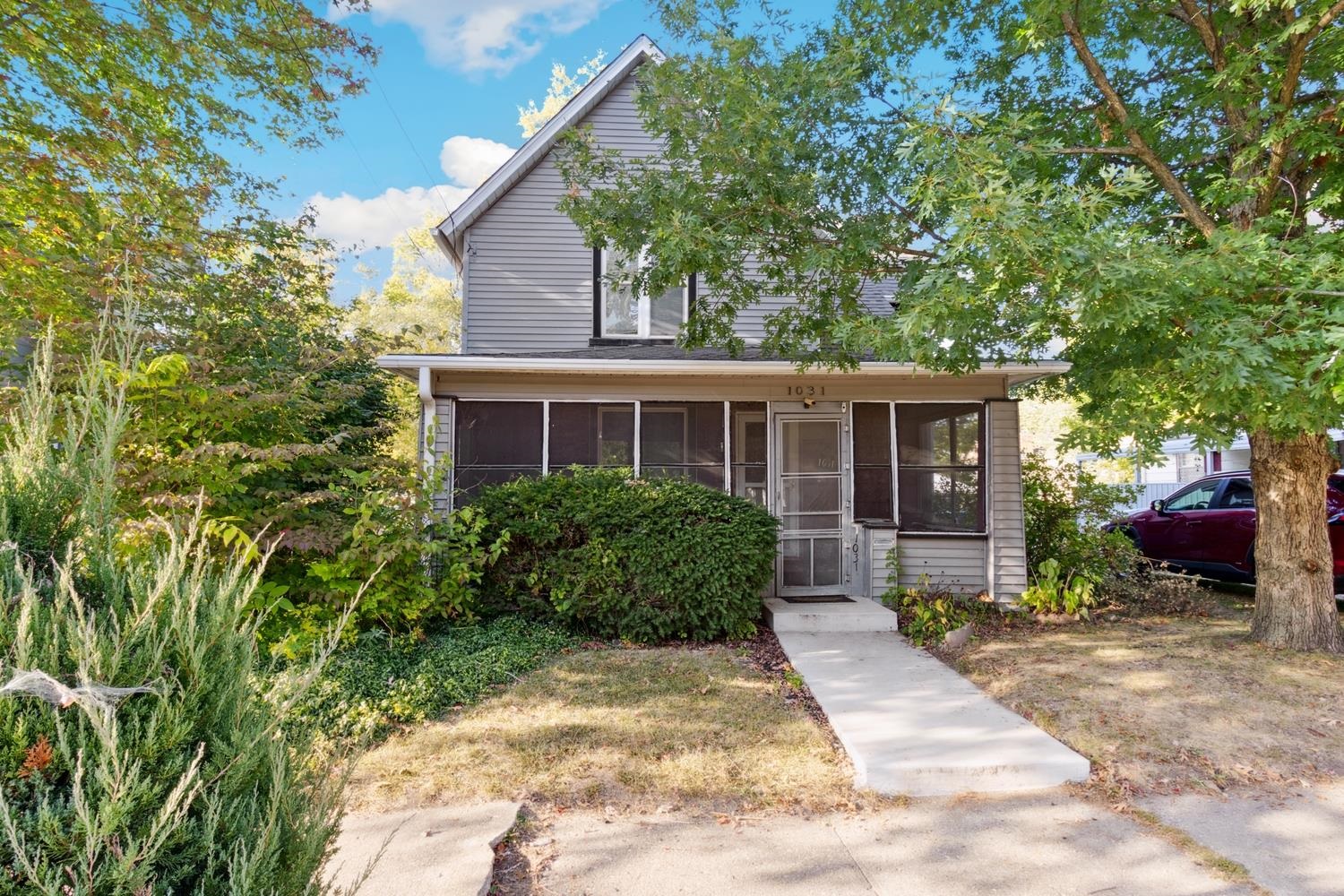 front view of a house with a patio