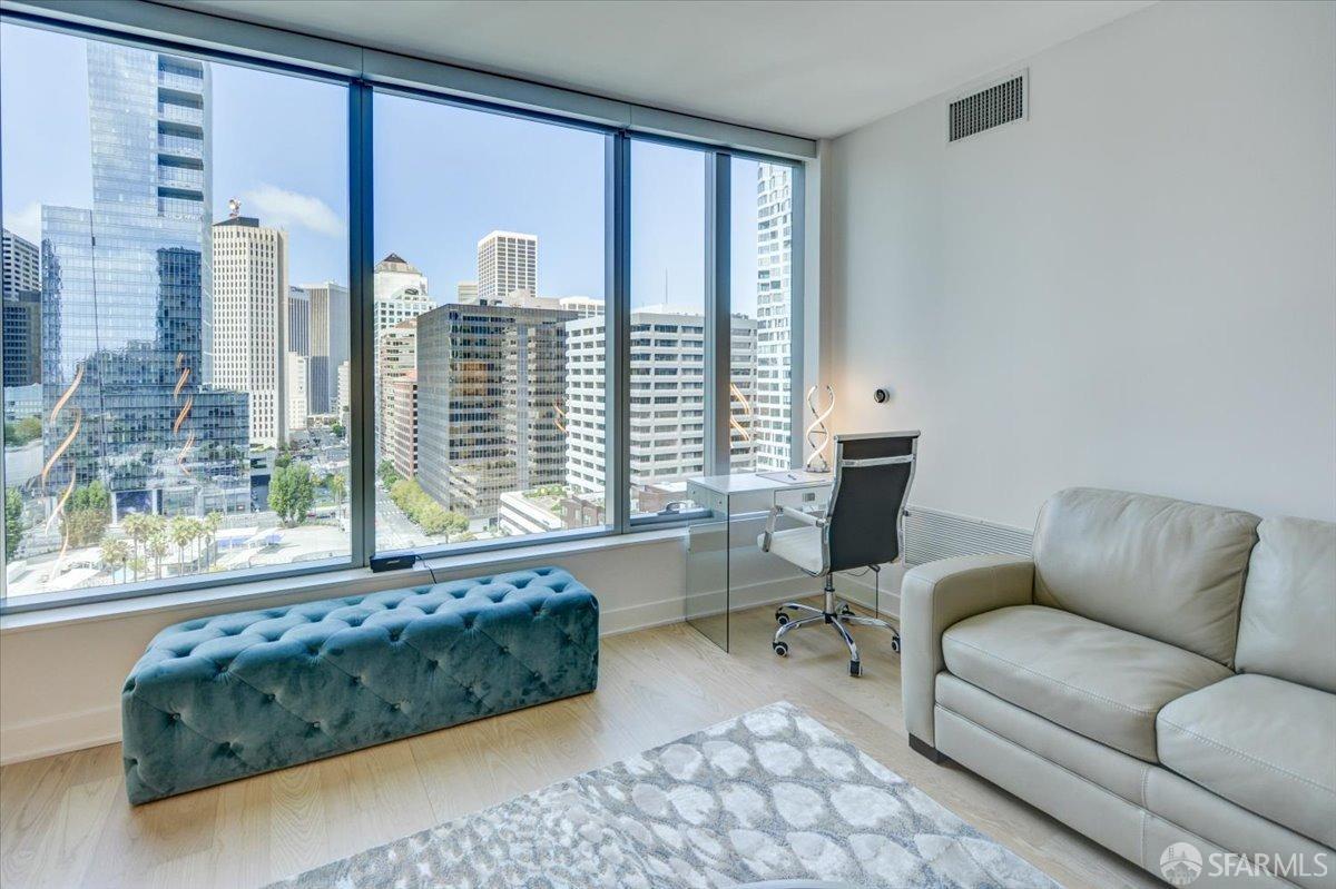 a living room with furniture and a window