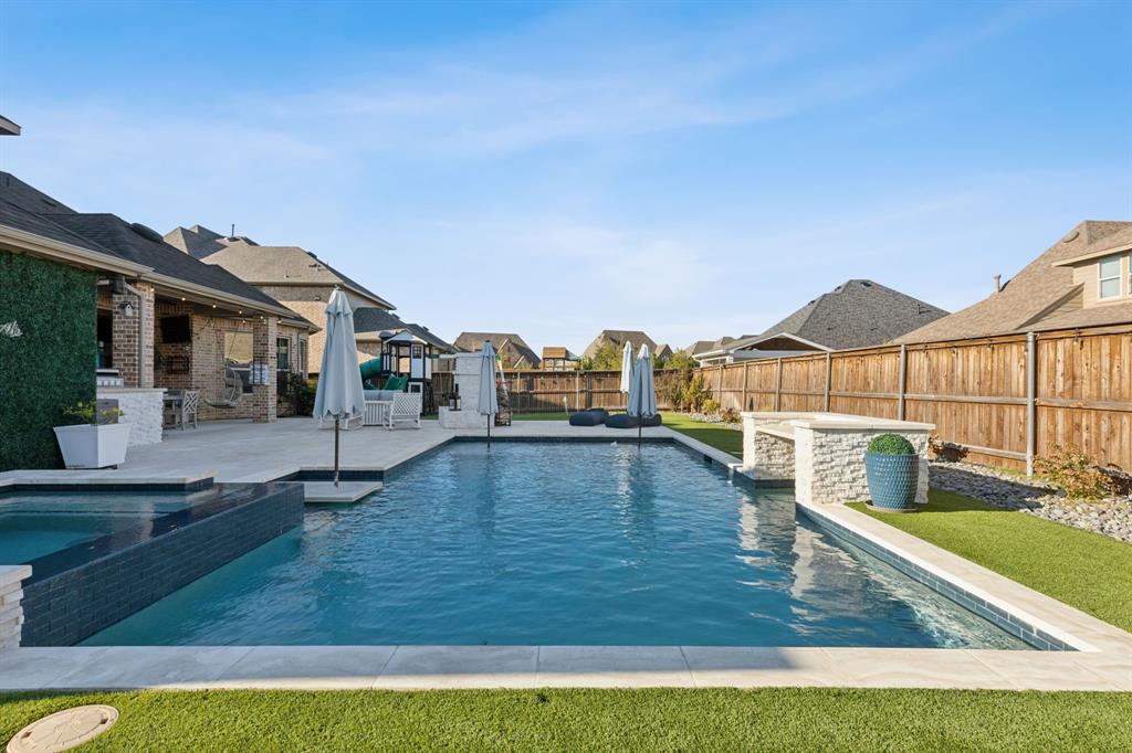 a view of a house with swimming pool