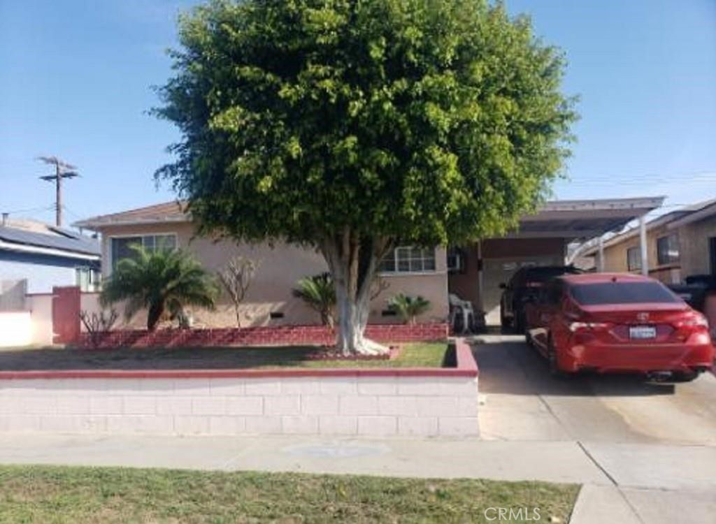 a car parked in front of a house