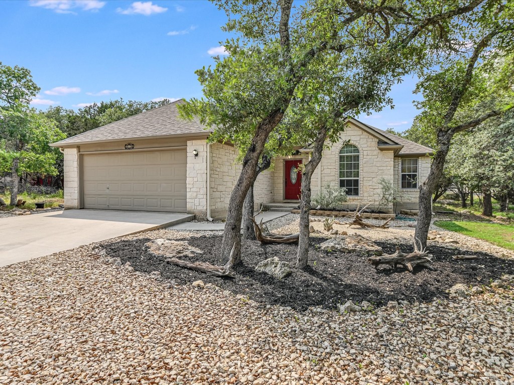 a house with trees in the background