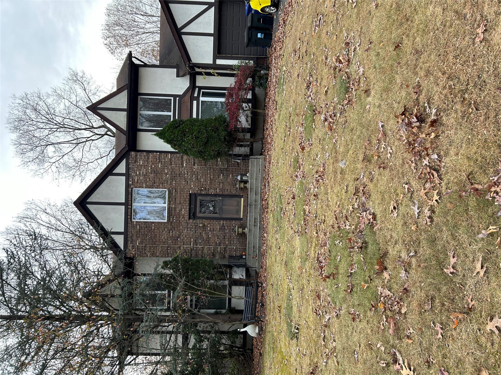 View of front of house featuring a front yard