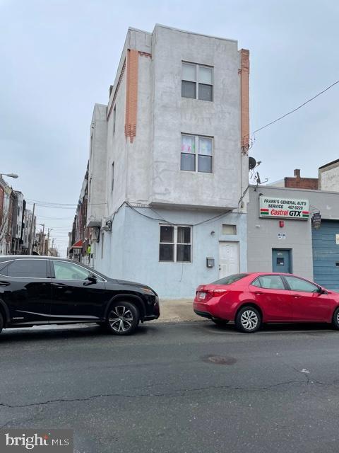 a car parked in front of a building