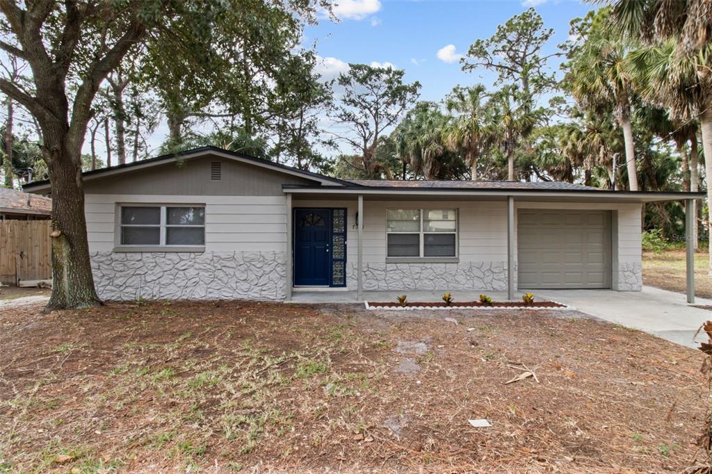 front view of a house with a yard