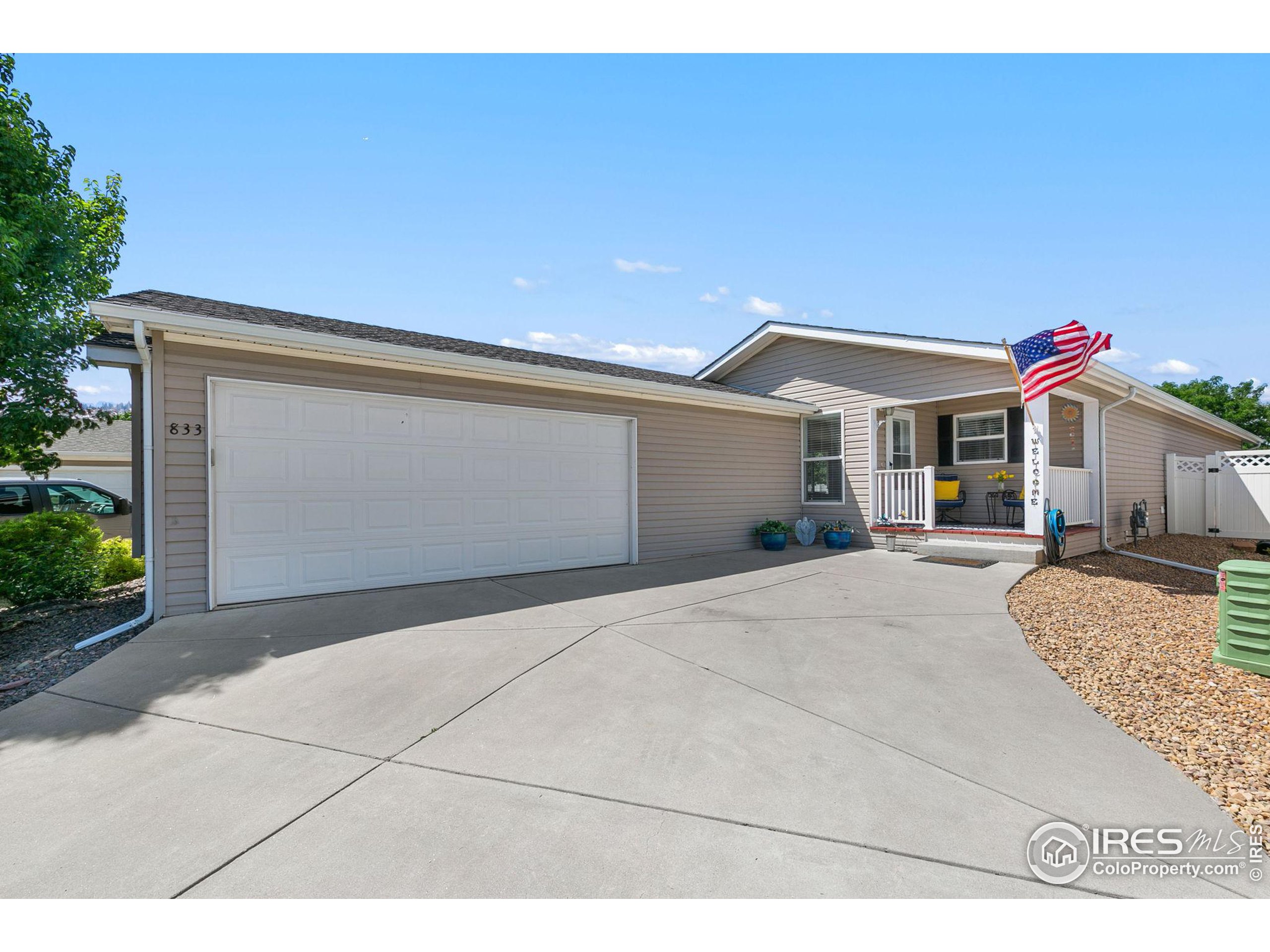 a front view of a house with a garage