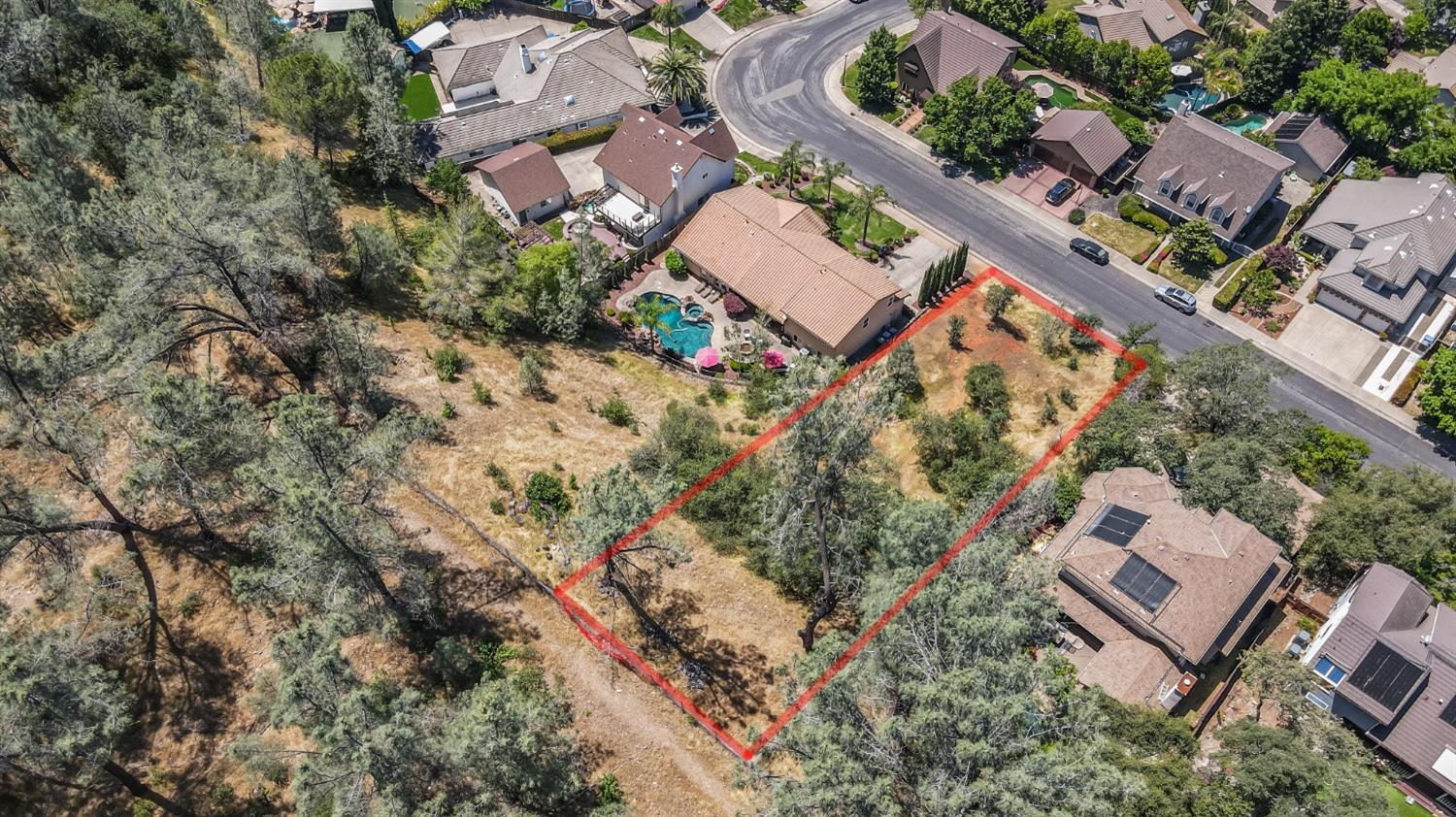 an aerial view of residential house with outdoor space