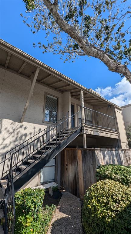 a view of a balcony with an outdoor space